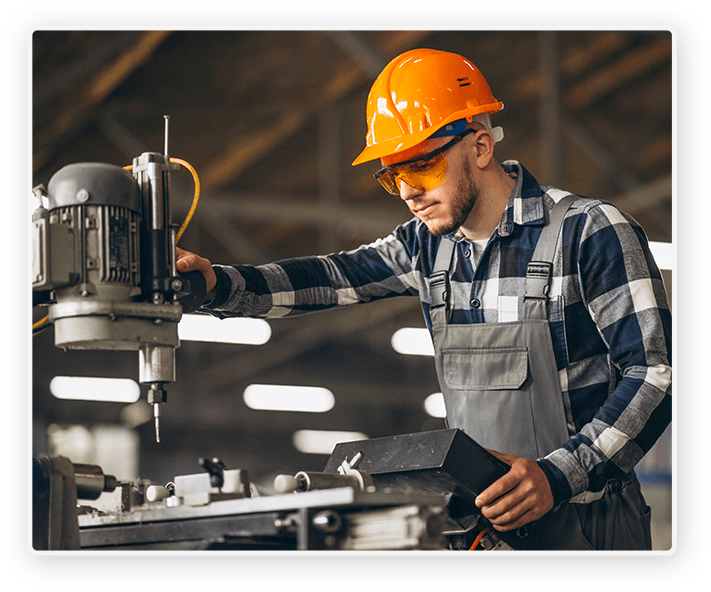 Industrial worker operating electrical equipment